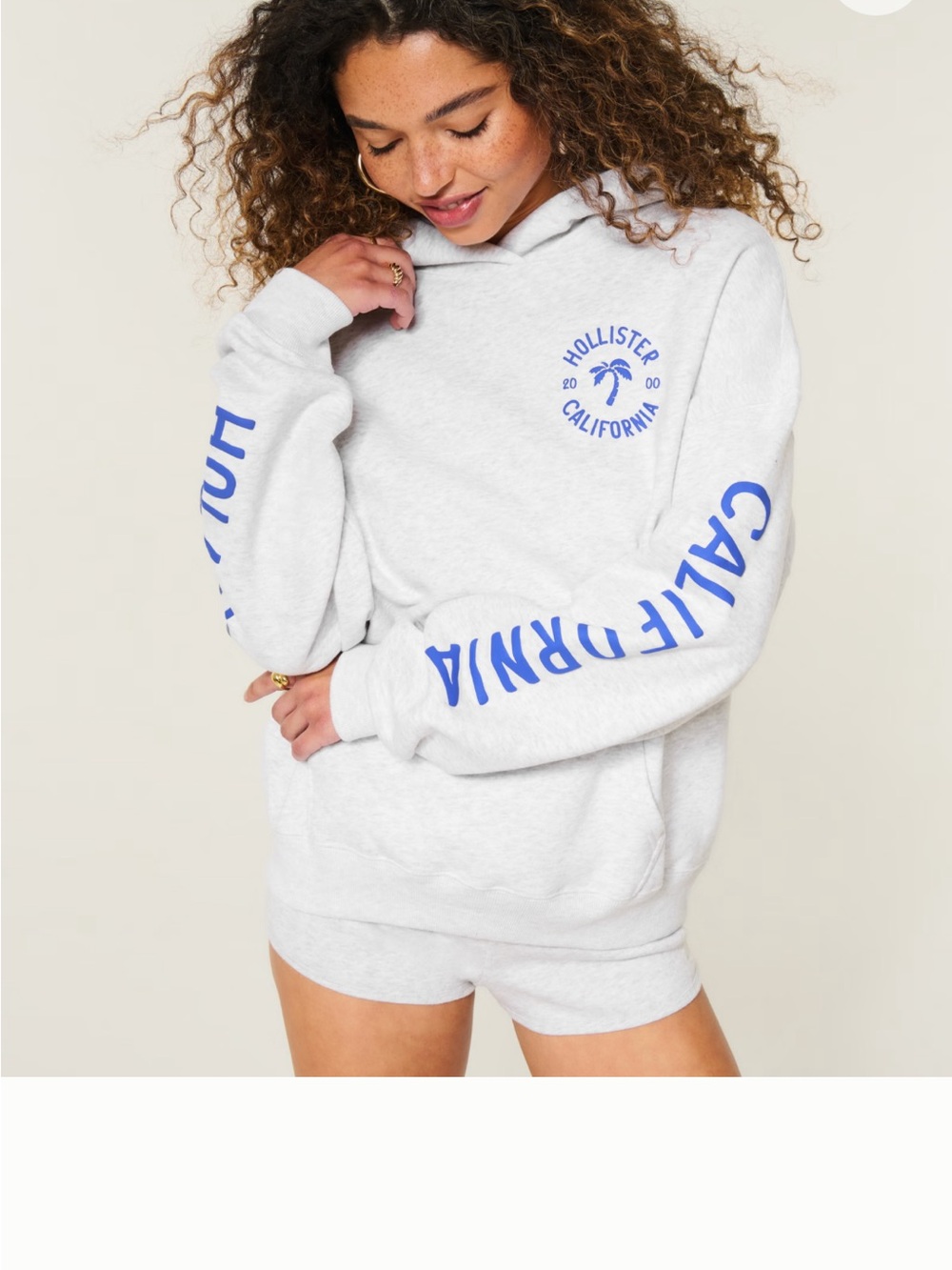 Hollister Light Gray Pullover Hoodie with Blue California Sleeve Logo